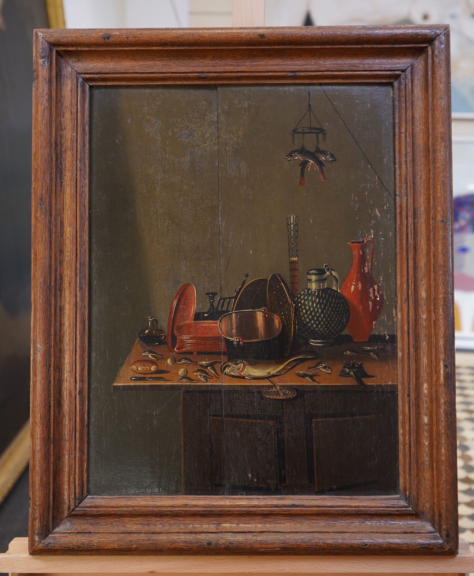 Follower of Gerrit Willemsz. Heda, Dutch (c.1620-c.1702), Still life with fish, jugs and cooking equipment